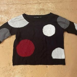 Black Kenzie sweater with grey, white and maroon dots